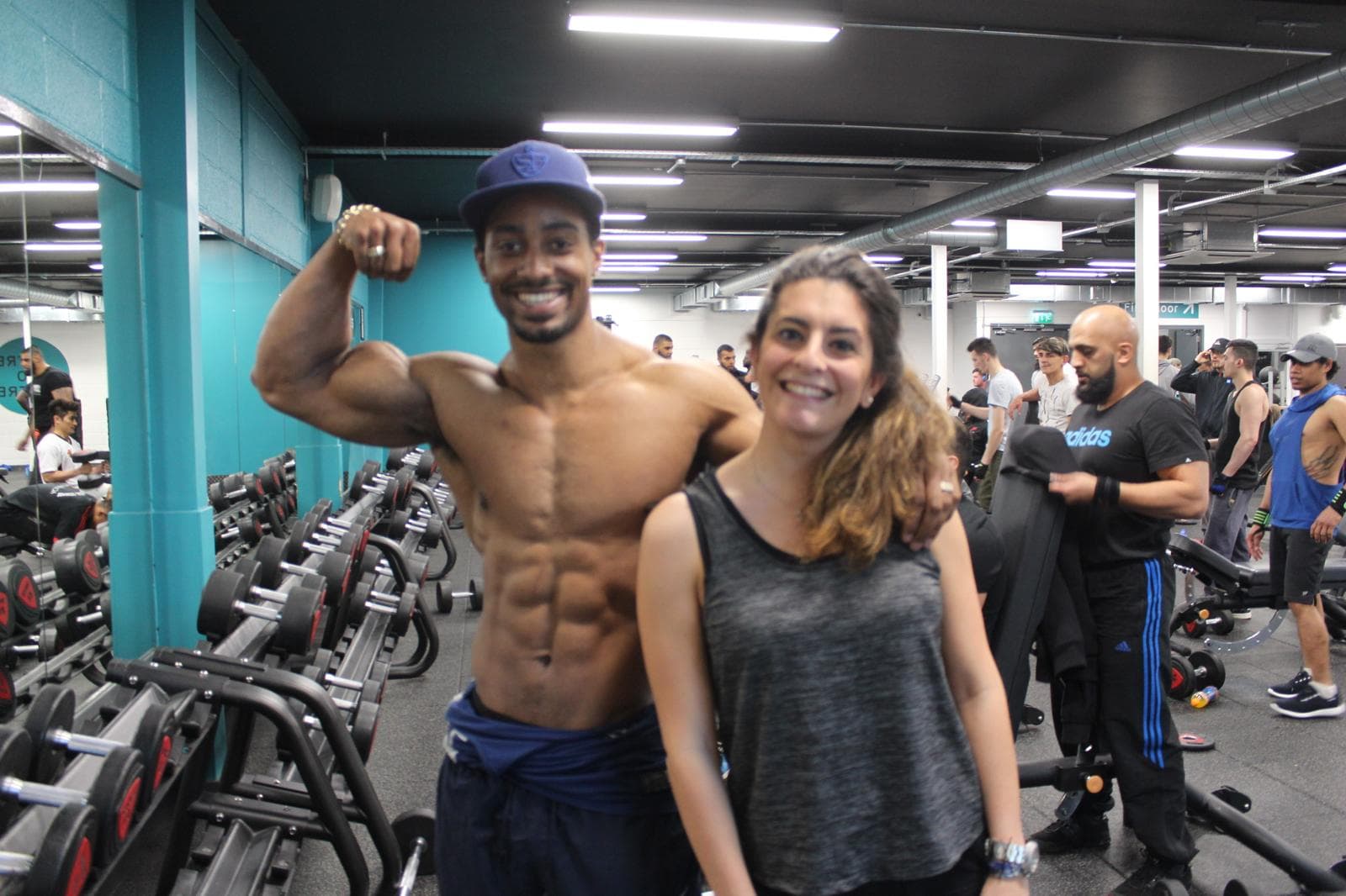 Antonio with a No8 client on the gym floor